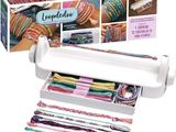 a close up of a roll of yarn next to a box of yarn