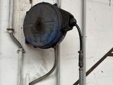 a wall with a bunch of tools hanging on it