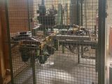 a picture of a large metal gate with a bunch of tools inside of it