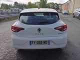 a white car parked on the side of the road