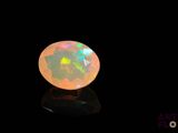 a white fire oplite in the dark with a black background
