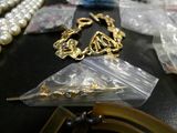 a lot of jewelry that is on a table