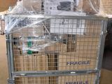 a large metal cart with many boxes on top of it