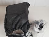 a bag and a stuffed animal sitting on the floor