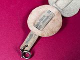 a keychain that has two keys attached to it