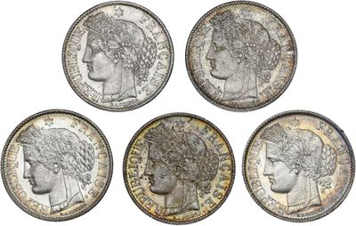 six different types of silver coins on a white background
