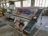a conveyor belt in the middle of a factory