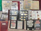 many different types of stamps on the pages of a book