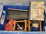 a blue box filled with various items in it