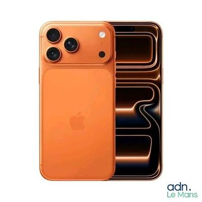 an image of an orange iphone is sitting in a metal container