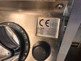 a close up of a machine with a button on it