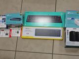 a lot of electronic devices on the floor next to each other