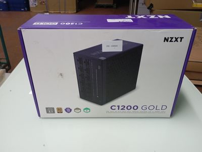 the box is open on the table with the computer in it