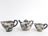 three different types of teapots sitting on a table