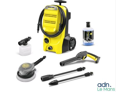 a close up of a yellow pressurer and other cleaning supplies on a white background