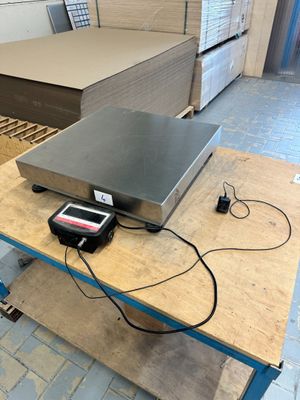 an image of a scale on a workbench in a factory