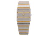 a close up of a watch with a yellow stripe on the face