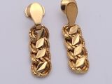 two pairs of gold tone earrings with leaves on them