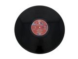 a black vinyl record with a red label on it
