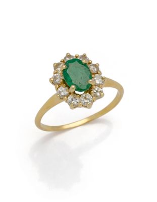 an emerald and diamond cluster ring