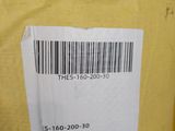 a barcode on the back of a yellow shirt