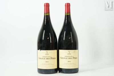 two bottles of red wine sitting next to each other on a table