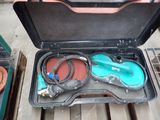a suitcase that has a pair of scissors in it