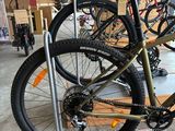 a bike that is sitting on a stand in a garage