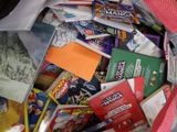 a bag full of books and magazines on the floor