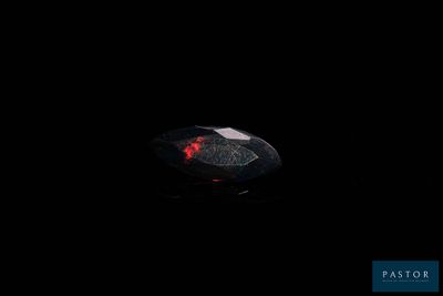 an image of a computer mouse lit up in the dark