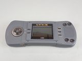 a small game console with a game on the screen