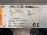 a label on the back of a motorcycle that is parked