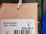 a person holding a box with a price tag on it