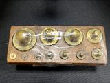 a wooden box with a lot of buttons on it