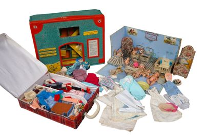 a suitcase with many items inside of it on a white surface