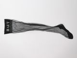 black and white photograph of a pair of socks on a white surface