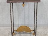 an image of a small table with a wooden top and metal legs