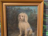 un tableau représentant un chien assis devant un mur