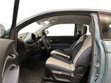 the interior of a car with the door open and the driver ' s seat up