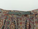 a close up of a skirt with a belt on it