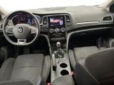 the interior of a car with a steering wheel, dashboard, and dashboard controls