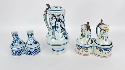 four different types of vases sitting on a white surface