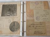 an old book with a lot of old photos on it