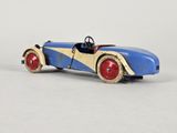 an old fashioned toy car with red wheels and a blue and yellow stripe