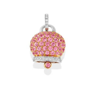 un pendentif en forme de cupcake orné de diamants roses et blancs sur fond blanc