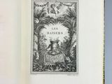 an open book with a black and white drawing on it