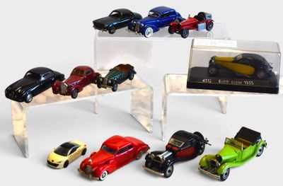 a lot of toy cars that are in a display case