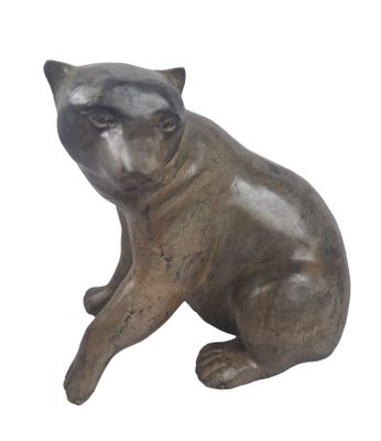 statue of a cat sitting on its hind legs on a white background