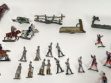 a lot of toy soldiers that are on the table