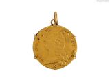 a close up of a gold coin on a white background